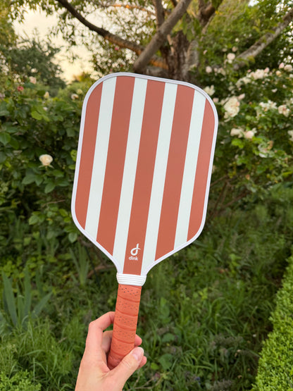 Striped pickleball paddle